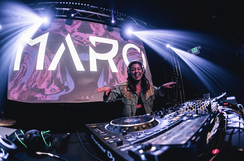 Image: woman deejaying