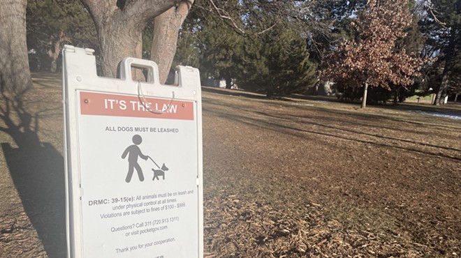 sign in park about dogs