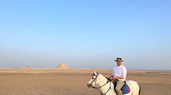 man on horse in desert