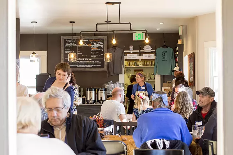 Image: Patrons seated inside the intimate interior of GraceFull Cafe