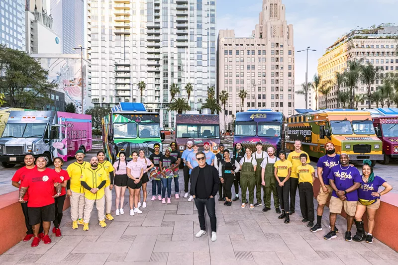 Image: People and food trucks backdropped by LA skyscrapers