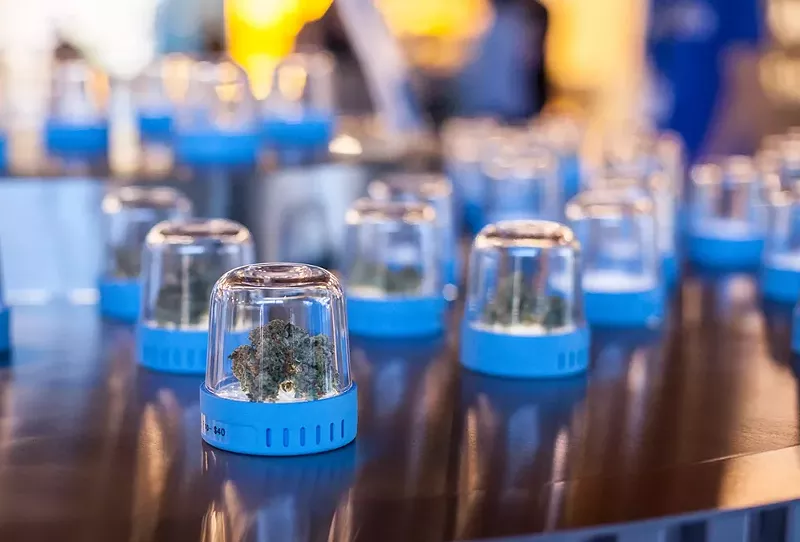 Image: jarred marijuana samples at dispensary