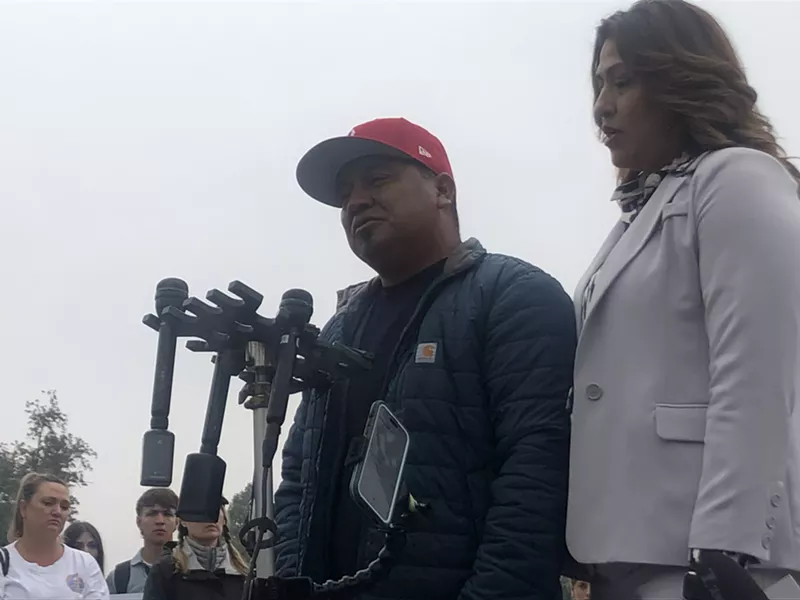 Image: Santos Garcia, the father of Luis Garcia, speaking about his son's murder at a press conference outside East High School on May 19.