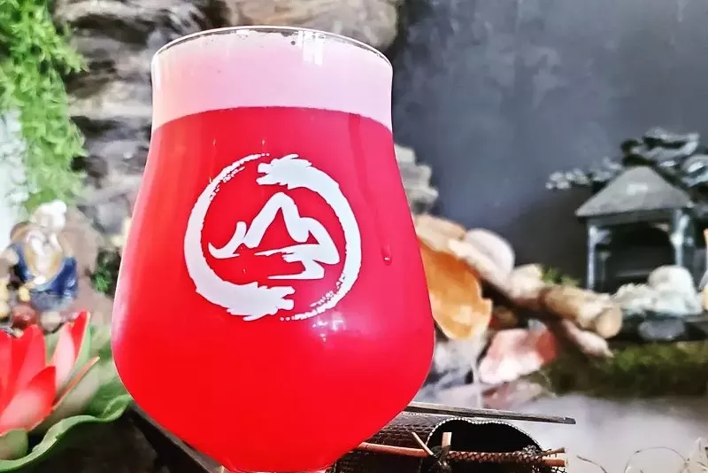 Image: red-hused beer in a glass