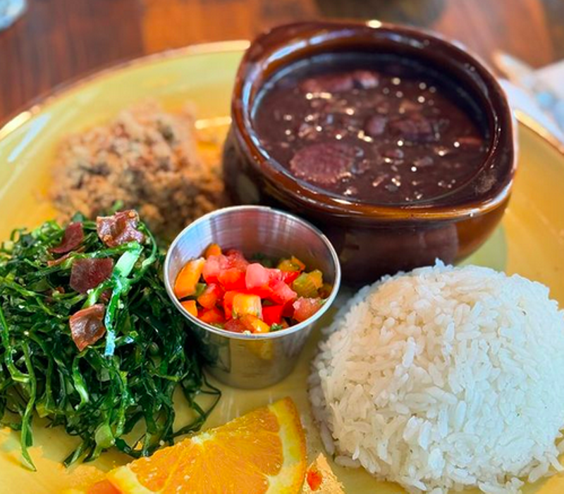 Image: beans and rice on a plate with greens