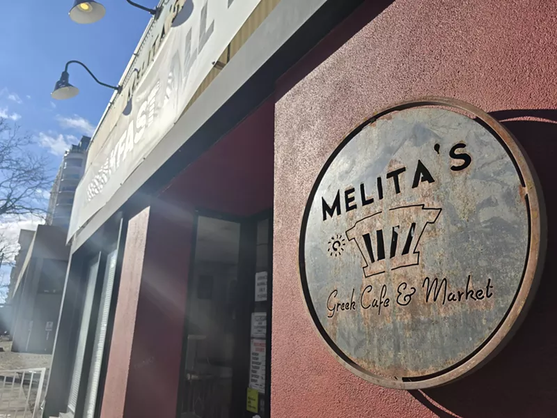 Image: metal sign on a building