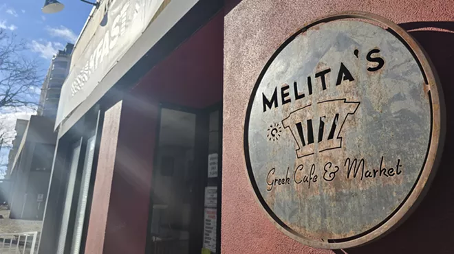 metal sign on a building