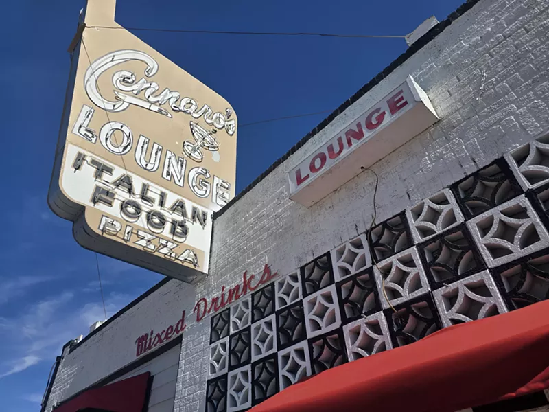 Image: old neon sign on a building