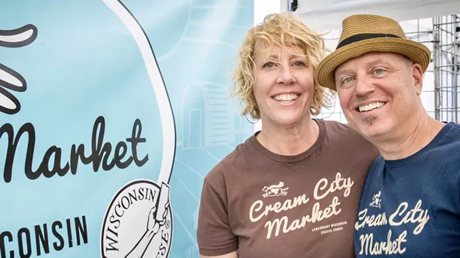 a man and a woman smiling