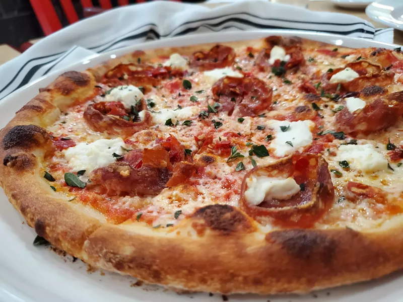Image: The Diavola pizza with Calabrese salami, ricotta and Calabrian chiles.