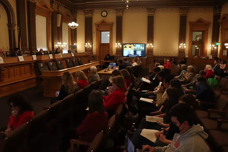Image: Students wait to testify in support of legislation which would mandate a three-day waiting period for gun purchases.