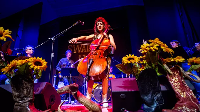 A woman plays cello