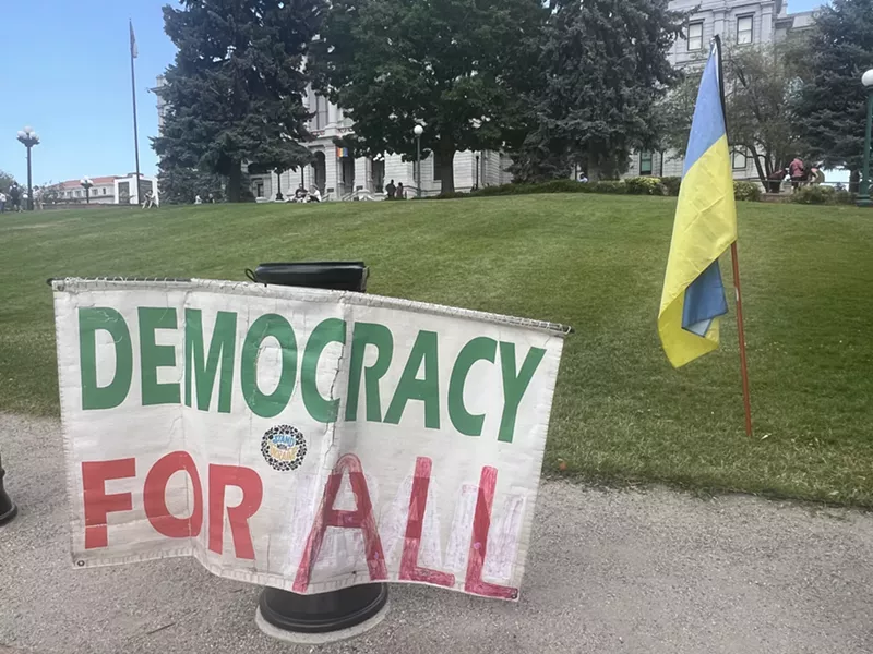 Image: Democracy for all sign at Denver protest