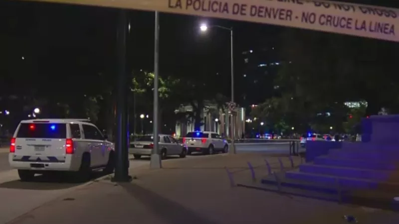 Image: A look at the scene of an August 6 triple shooting near the intersection of Colfax and Broadway.
