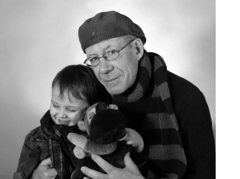 Image: man in beret with boy