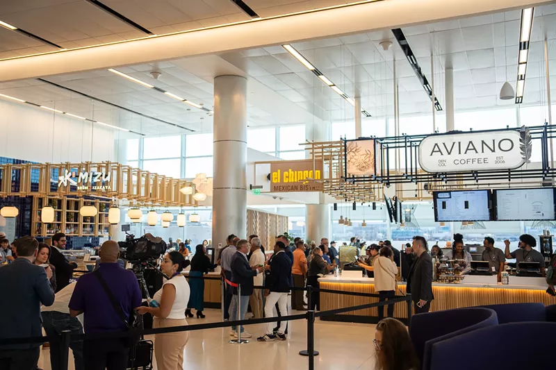 Image: restaurant kiosks in a busy airport