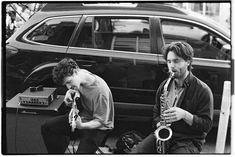 Image: bass player and saxophone player
