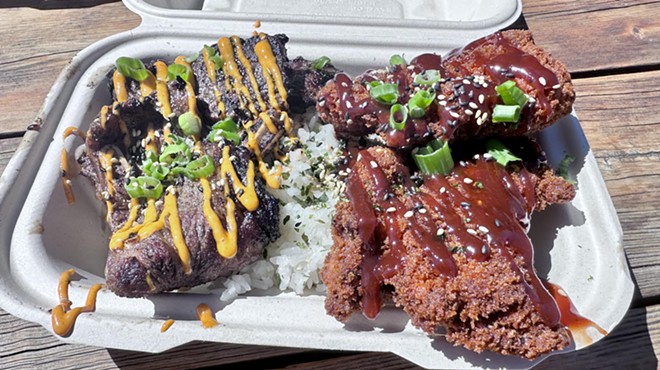 Kalbi short ribs and fried chicken katsu in a to-go box