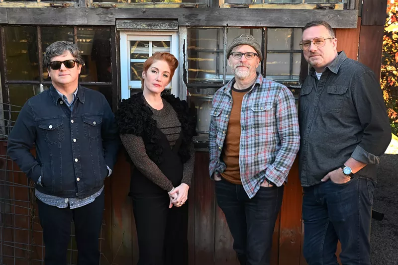 Image: band with four members