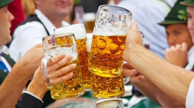 toasting with beer