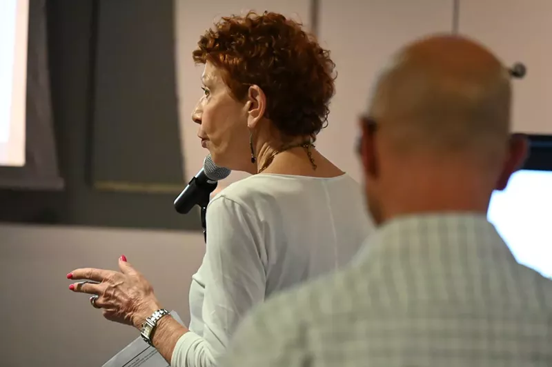Image: A Golden Triangle resident speaks at a community meeting.