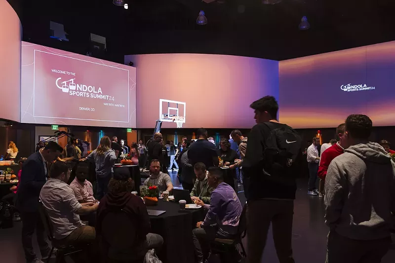 Image: people at a tech/sports summit