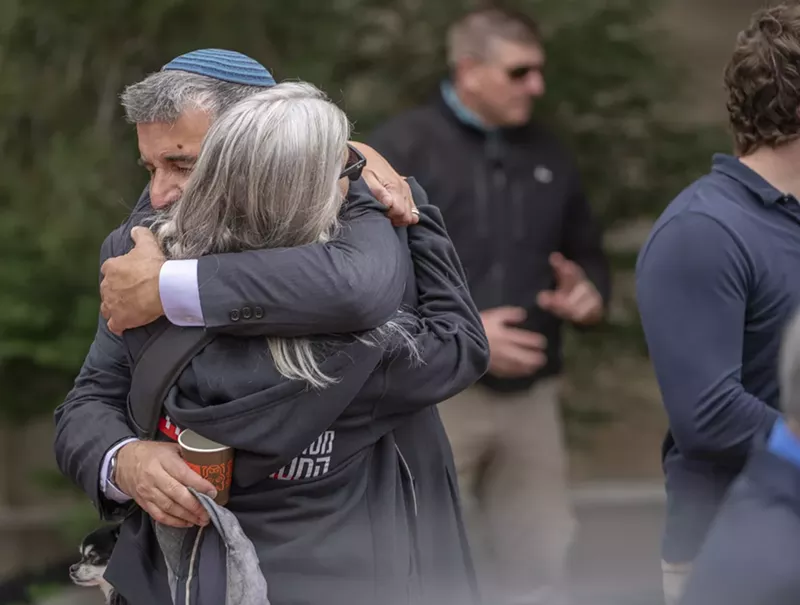Image: man and woman hug