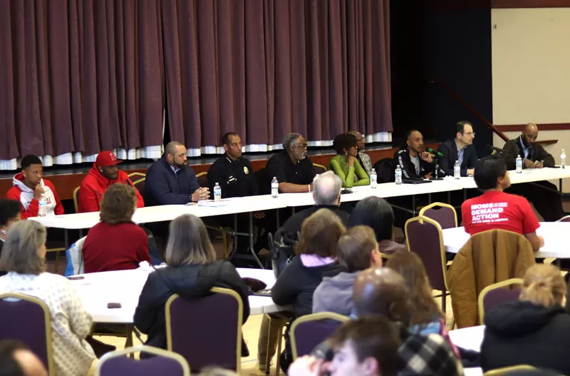 Image: DPD Chief Ron Thomas and other local leaders at a community discussion on March 28.