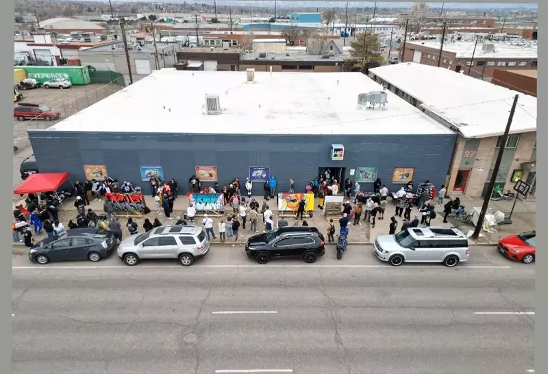 Image: people outside a building in Denver