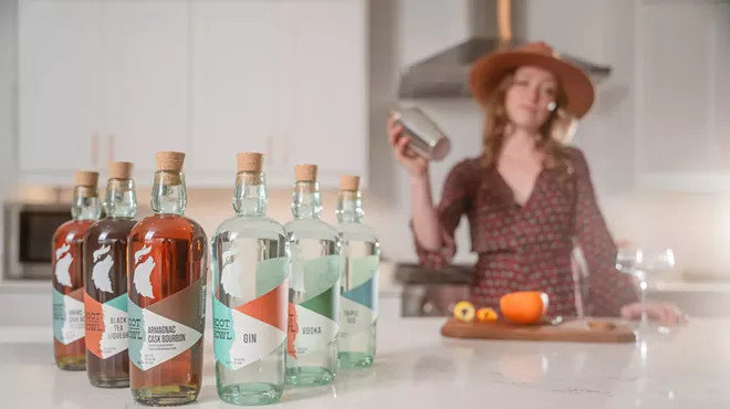 Spirits in a lineup on a counter.