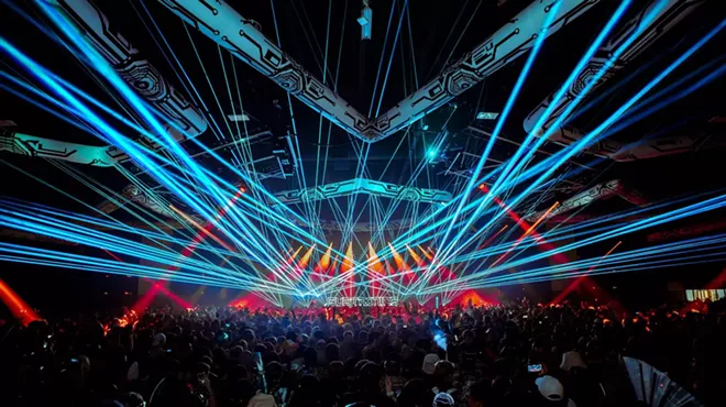 light show at a rave with lazers