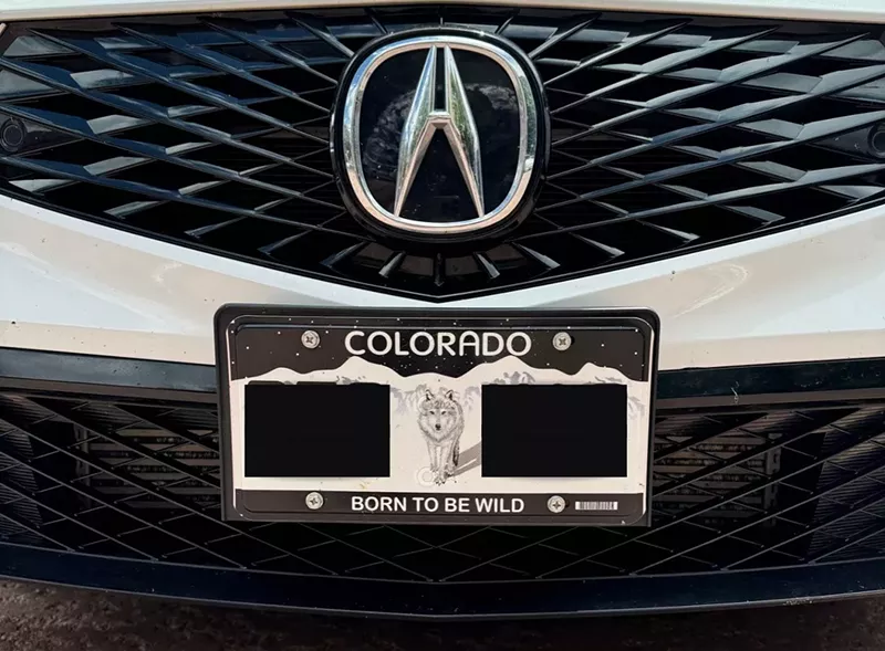 Image: Colorado Born to Be Wild wolf license plate on acura