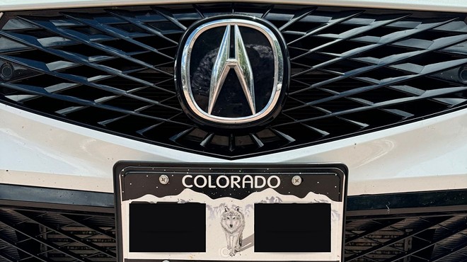 Colorado Born to Be Wild wolf license plate on acura