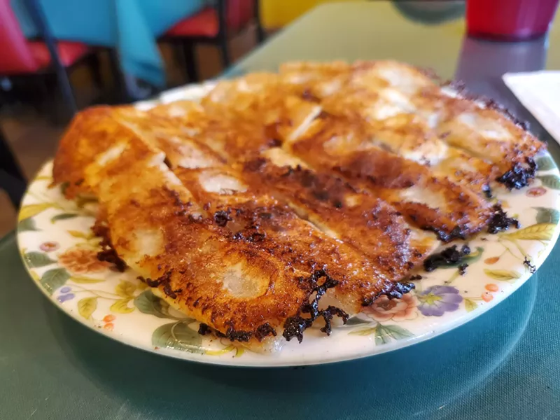 Image: a plate of potstickers