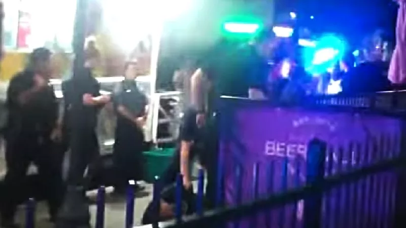 Image: A screen capture from witness video following a July 17 officer-involved shooting in Denver that injured a suspect and five bystanders.