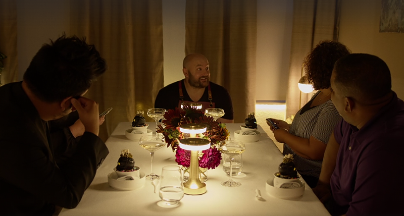 Image: man at dinner table