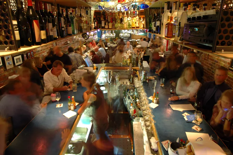 Image: people inside a busy restaurant