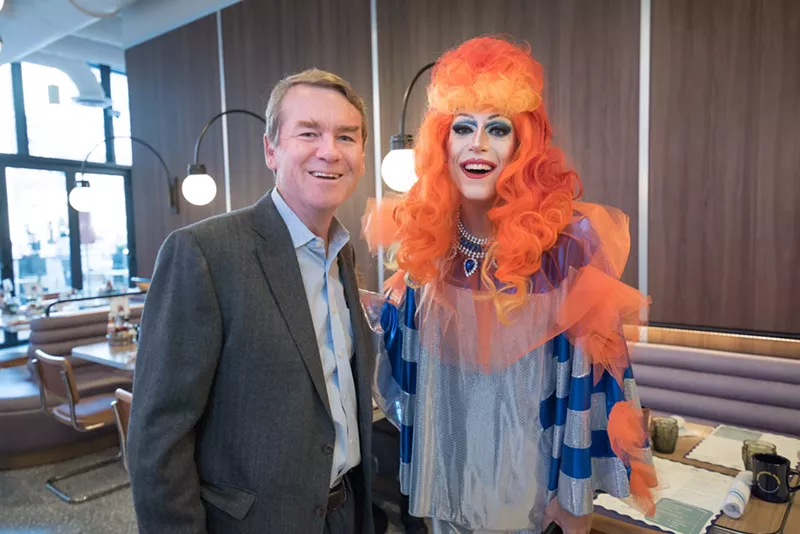 Image: Senator Michael Bennet with Laura Menorah at a past Saturday Serve.