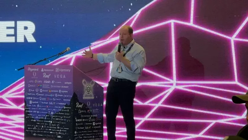 Image: Jared Polis was feeling it on stage at ETHDenver.