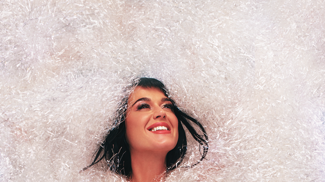 katie perry surrounded by bubbles.