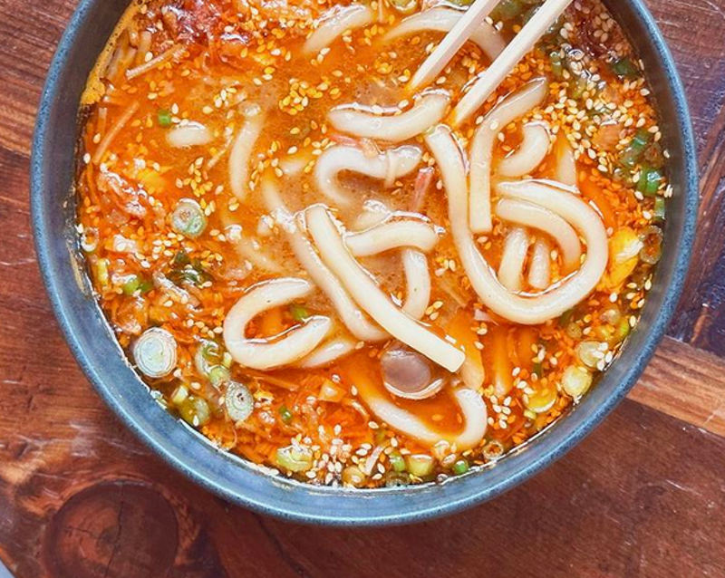 Spicy Kai Udon with crab and pickled clams is on the opening menu at Kawa Ni.