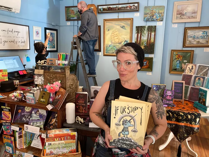 Image: Kaz Windness adds the personal touch to thrift-store art.