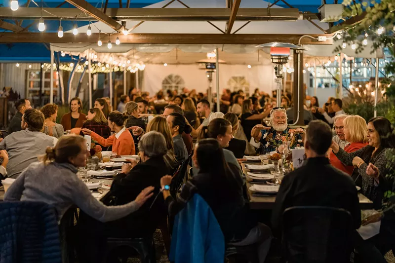 Image: people seated at tables