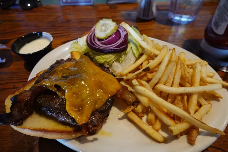 Image: The burger is as dry as the jokes at Legends.