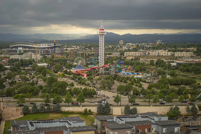 Image: A panoramic view of Denver facing west, showing the Elitch's Amusement Park and Broncos stadium.