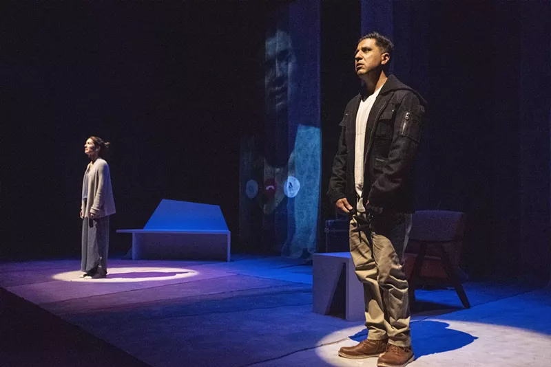 Image: man standing on stage