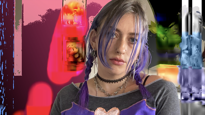 a woman with purple hair in braids wearing a choker and patchwork shirt