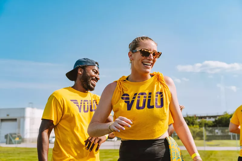 Image: people in yellow shirts