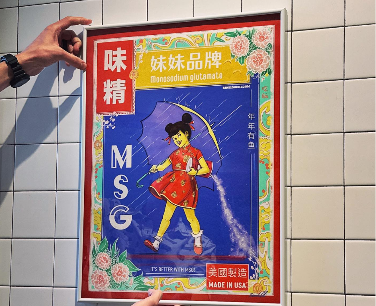 Artist Brenda Chi created the MSG Girl poster that hangs on a wall at MAKfam.