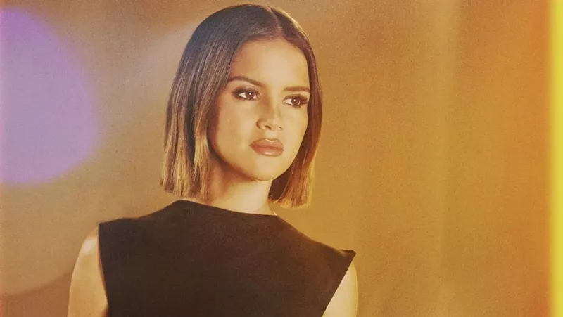 Image: singer maren morris in a brown shirt